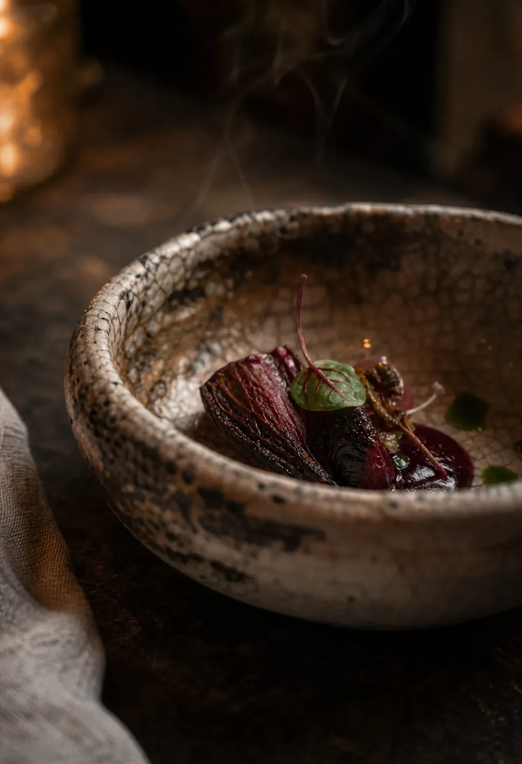 Handmade ceramic bowl with a small seasonal tasting course
